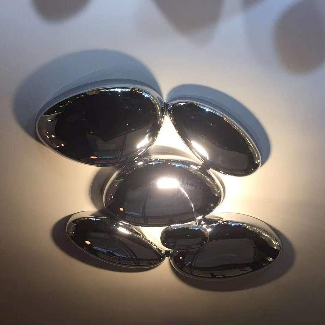 Clérachic 6-head Chrome Ceiling Light from below, five large chrome pebbles and one small center pebble with an LED halo.