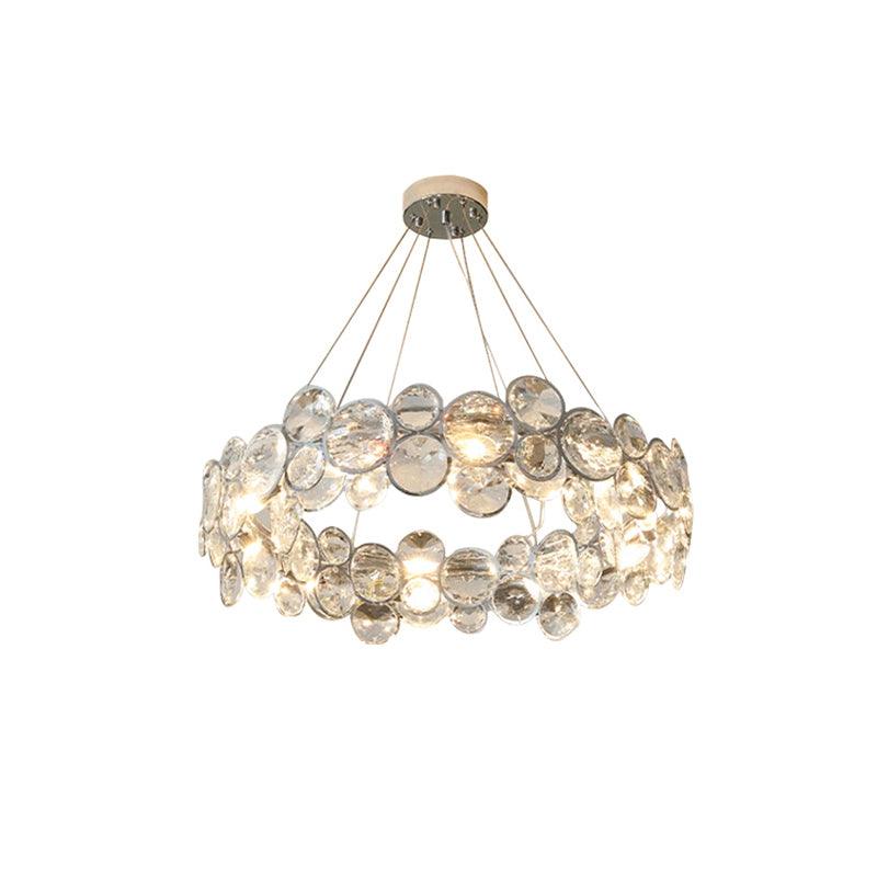 Round Clérachic crystal chandelier with chrome-rimmed discs, shown on a plain white background.