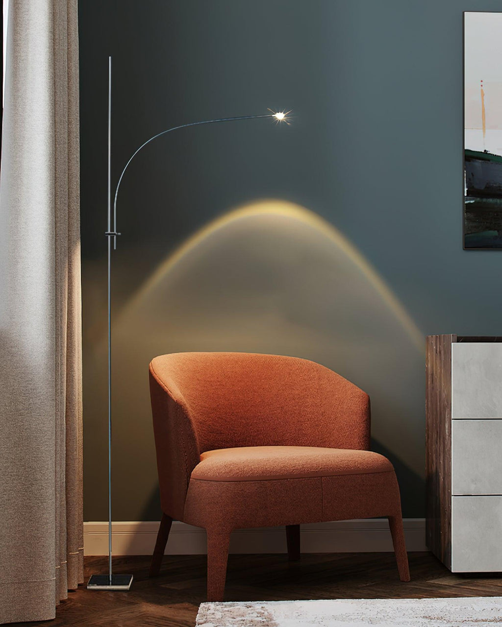 This Clérachic floor lamp rises beside a curtain, its warm arc of light falling over a rust-orange armchair.