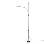 A Clérachic chrome floor lamp with a long curved arm and trailing cord, shown full height on a plain white backdrop.