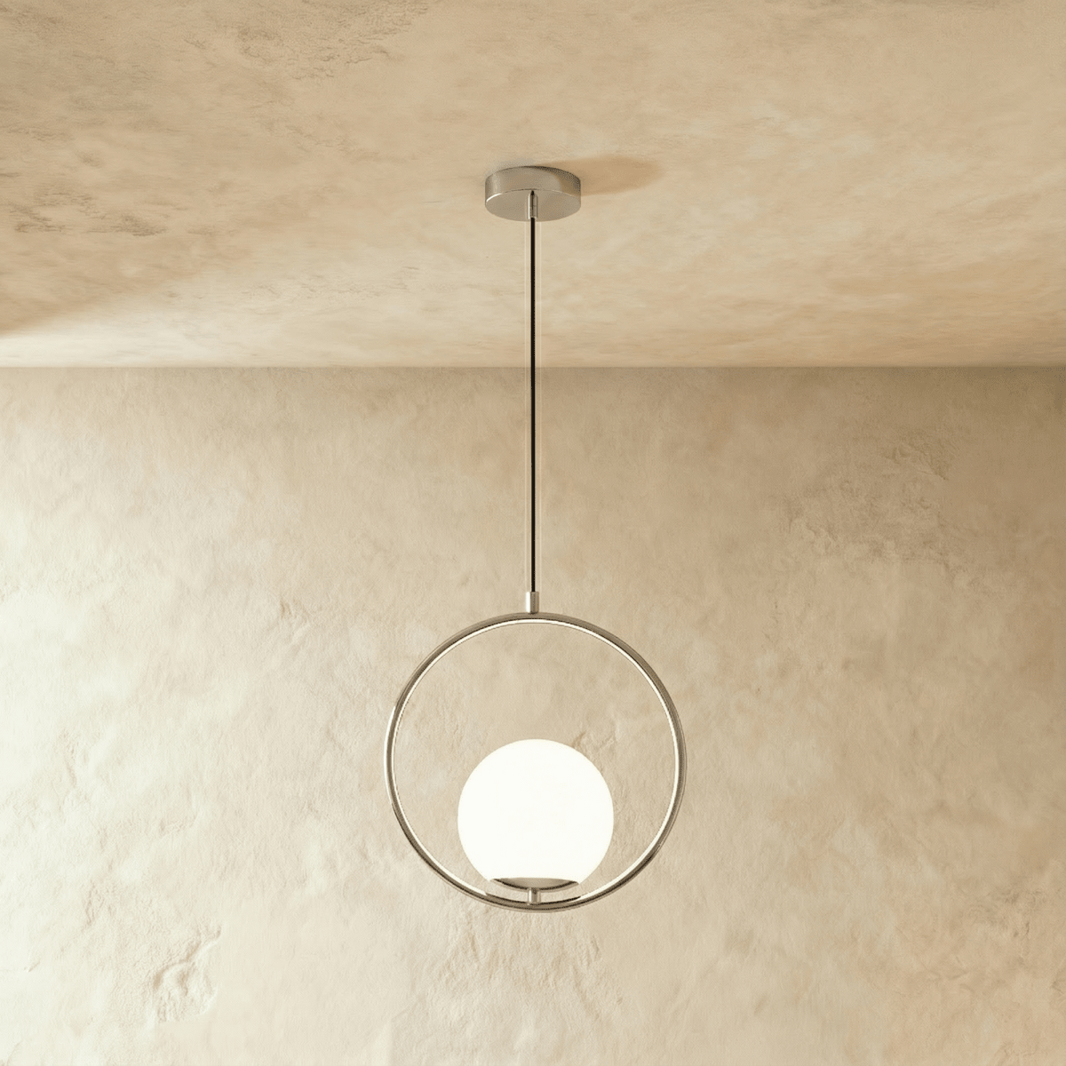 Clérachic Cells pendant light in Circle, Chrome, a polished nickel ring cradling a frosted glass globe shade.