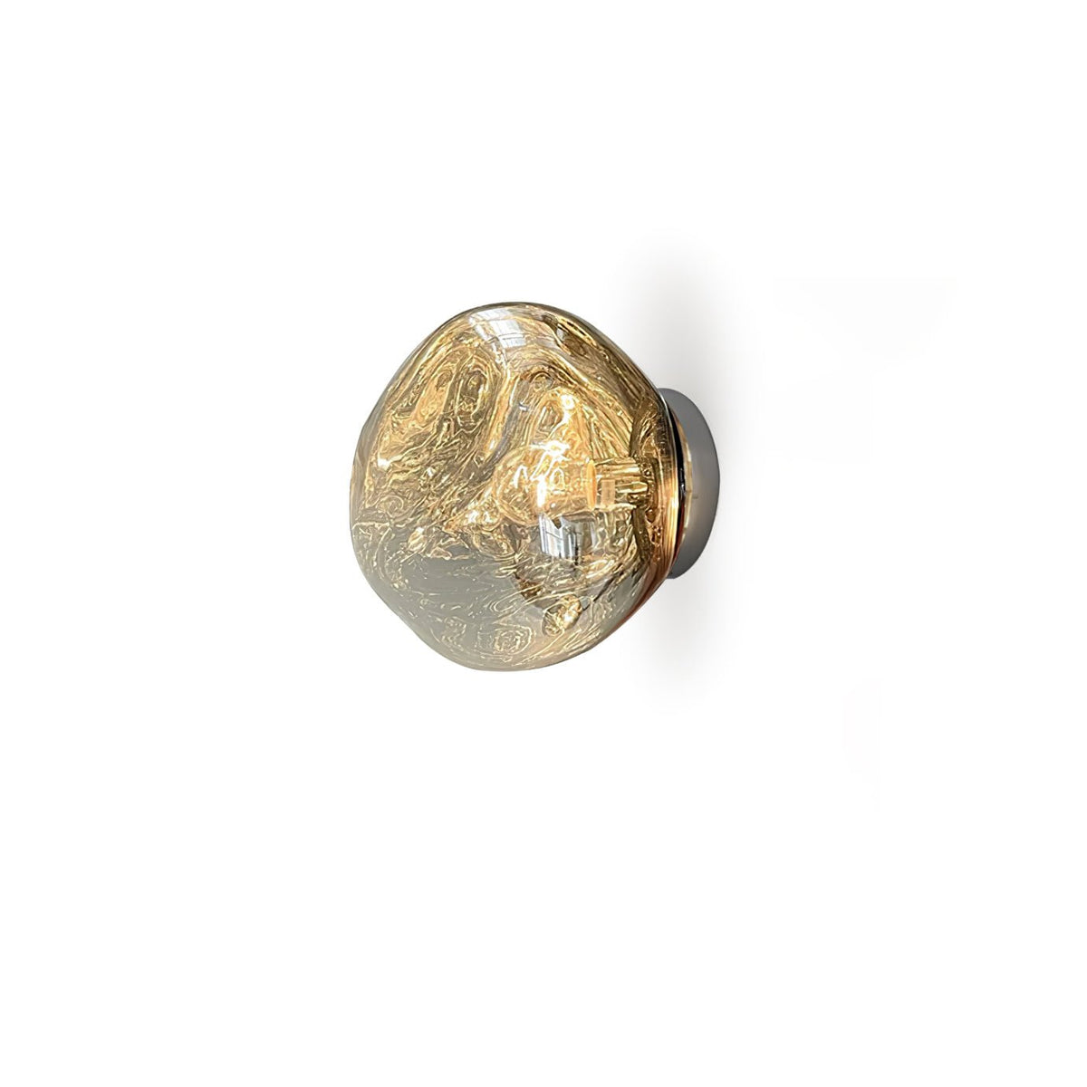 A Clérachic wall light with a gold-toned melted-glass shade and a dark metal backplate, on a white background.