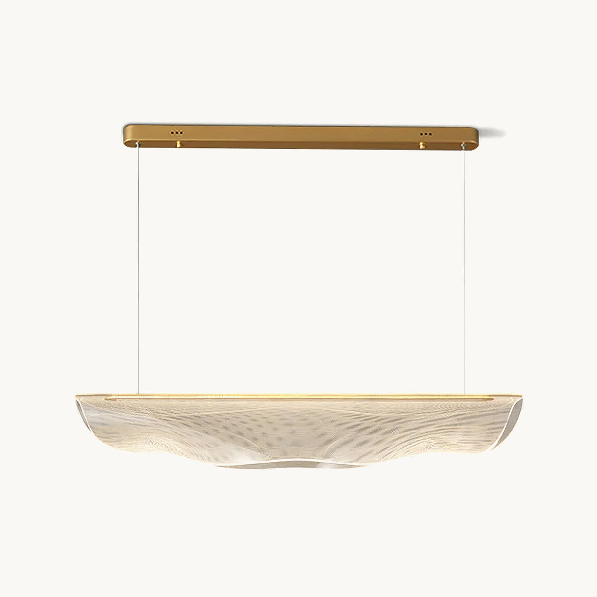 This Clérachic pendant light on a plain white backdrop, a long gold canopy bar with two fine wires holding a rippled, clear acrylic shade.