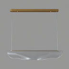 Unlit, this Clérachic pendant light hangs on a mid-grey backdrop, the shade clear and rippled under a gold canopy bar.