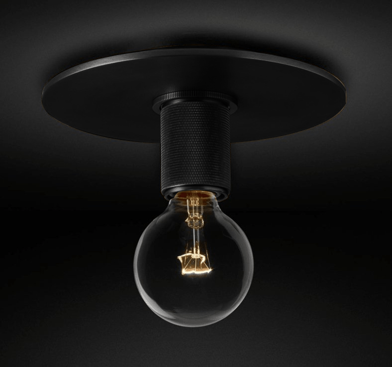 Wide black ceiling plate with a knurled socket and an unlit globe bulb, on a dark background, a Clérachic flush mount.