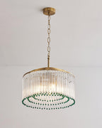 From below, this Clérachic chandelier shows rings of green beads inside its drum of clear glass rods and a gold top ring.