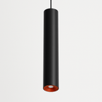Clérachic cluster pendant light in matte black, a slim cylindrical shade hanging from a thin black cord on white.