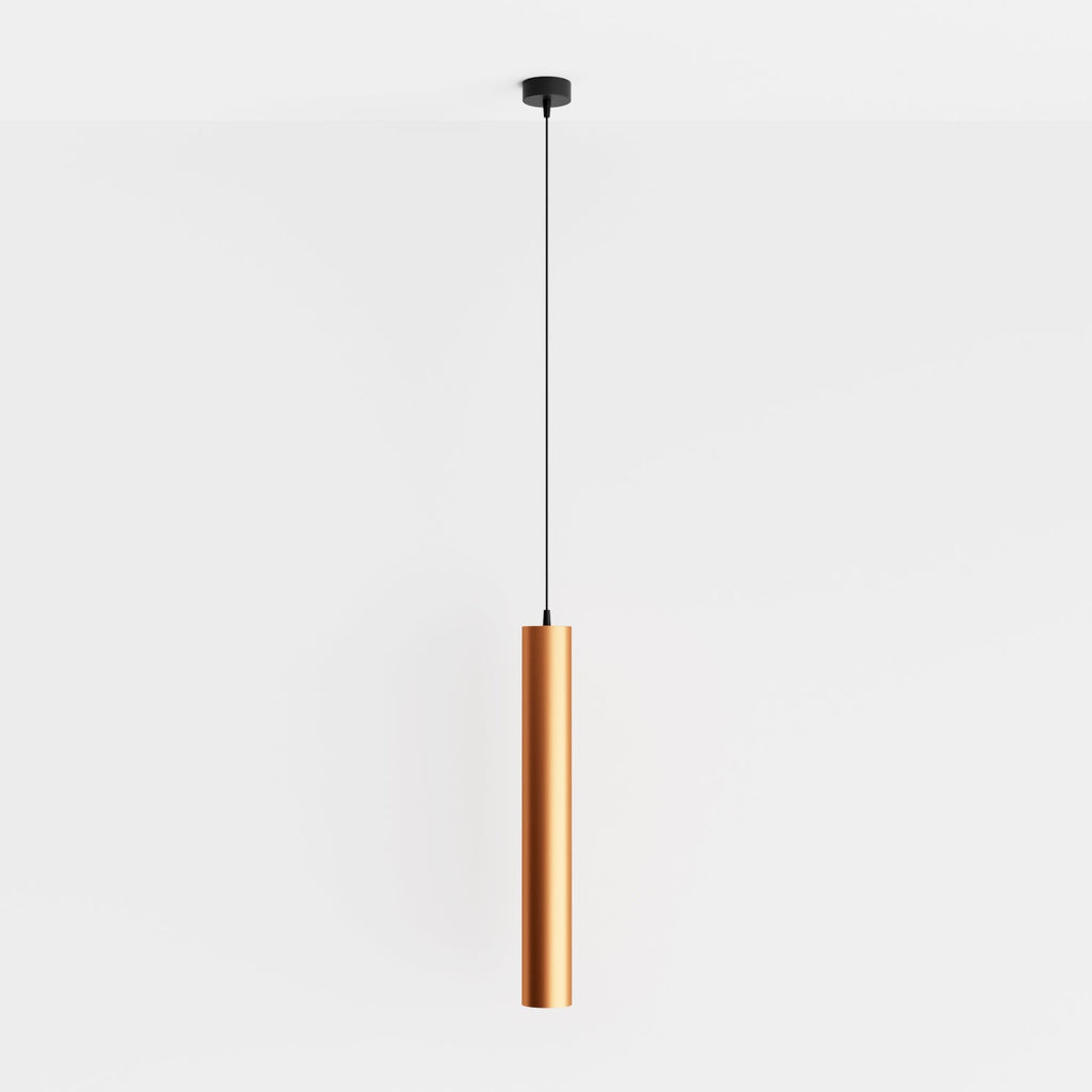 Clérachic cluster pendant light in brushed gold hangs from a black ceiling canopy against a white studio backdrop.