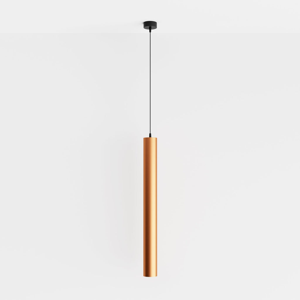 Clérachic cluster pendant light in brushed gold drops on a slim cord from a round black ceiling canopy on white.
