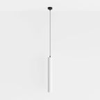 Clérachic cluster pendant light in matte white drops on a fine black cord from a round ceiling canopy on white.