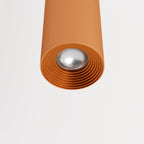 Clérachic cluster pendant light detail in brushed gold shows its ribbed reflector ring and frosted lens beneath.