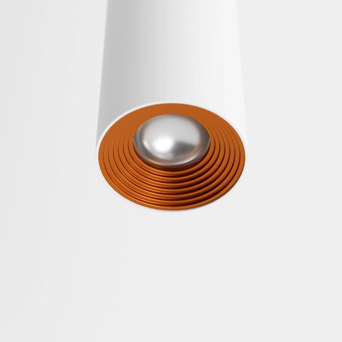 Clérachic cluster pendant light detail in matte white shows its copper-tone reflector ring and frosted lens beneath.