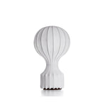 Clérachic table lamp on a white background, its rounded ribbed shade above a narrow stem and a dark wooden base.
