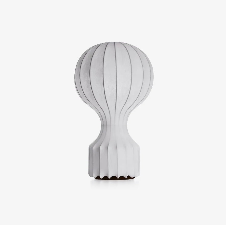 Clérachic table lamp on a light grey backdrop, its fine vertical ribs running from the round shade down to the ribbed base.