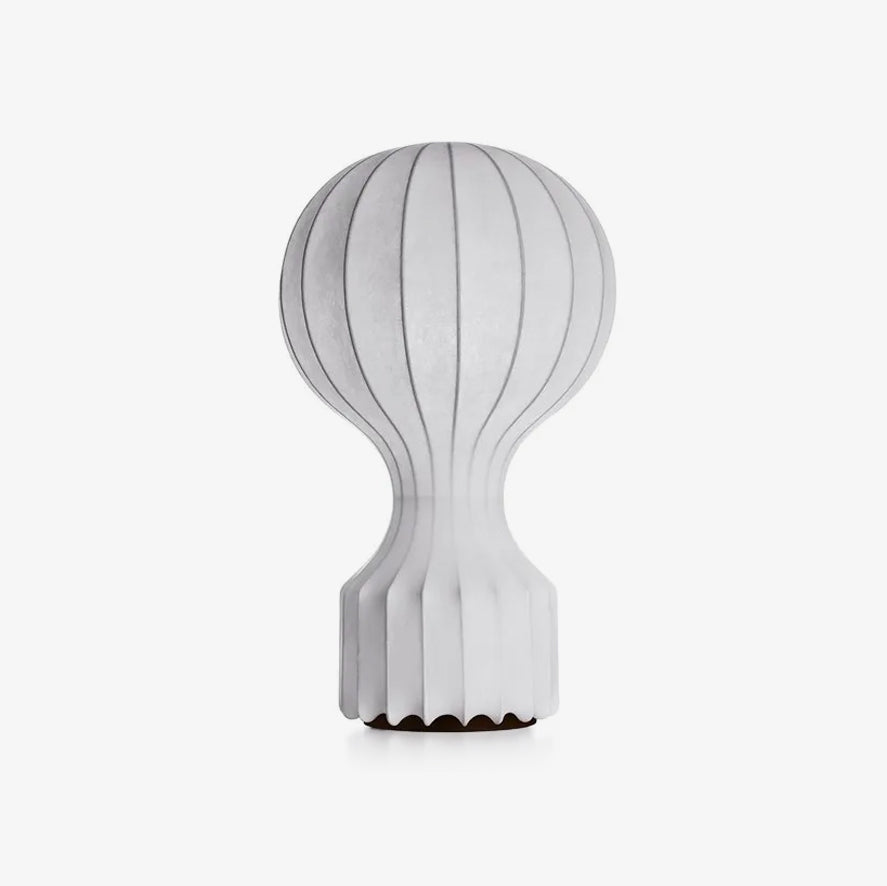 Front view of a larger Clérachic table lamp on a white background, with a rounded shade and a flared, ribbed base.