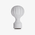 Front view of a larger Clérachic table lamp on a white background, with a rounded shade and a flared, ribbed base.