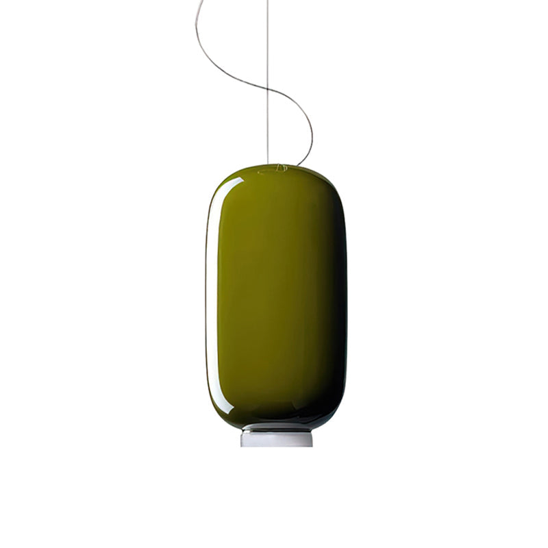 Tall rounded olive-green glass shade with a white base, this Clérachic pendant on a plain white backdrop.