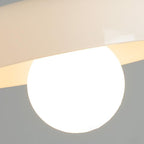 Clérachic white glass drum ceiling light photographed close up, the lit opal globe sitting just below the glossy rim.