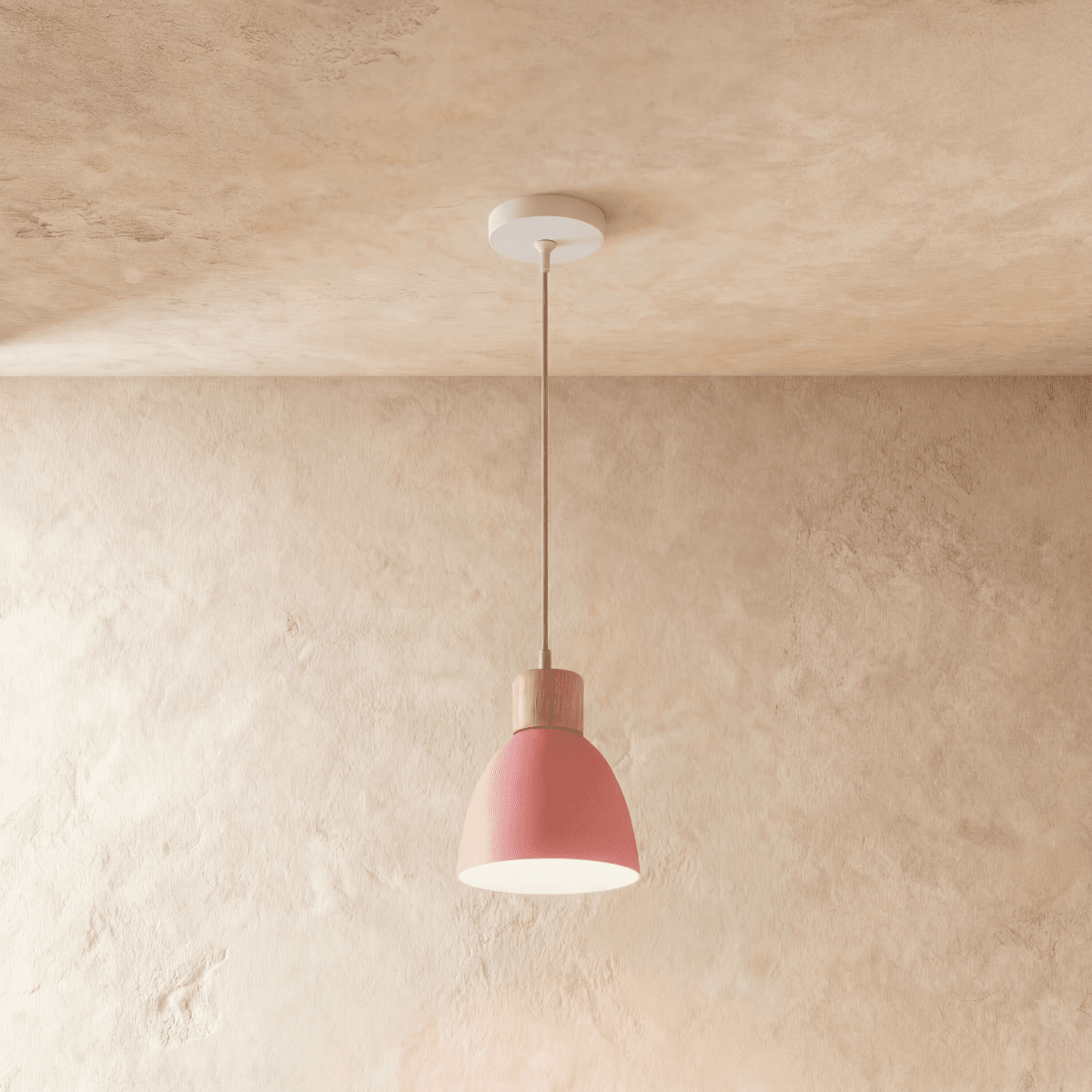 Side angle of the Clérachic single-head pink wood disc pendant light with its wood collar and slim ceiling cable.