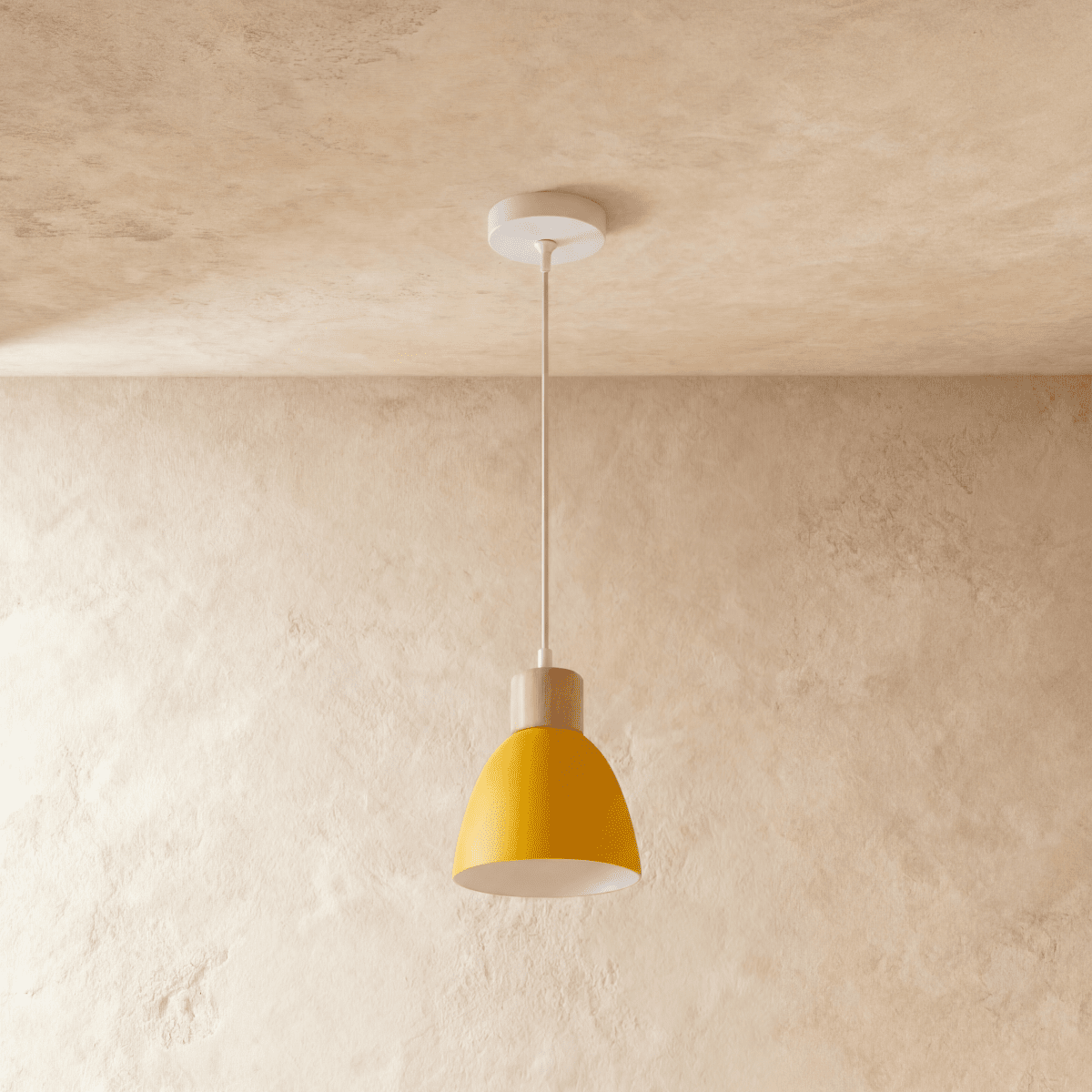 A single Clérachic wood disc pendant light in mustard yellow hangs from a round white ceiling canopy on a plaster wall.
