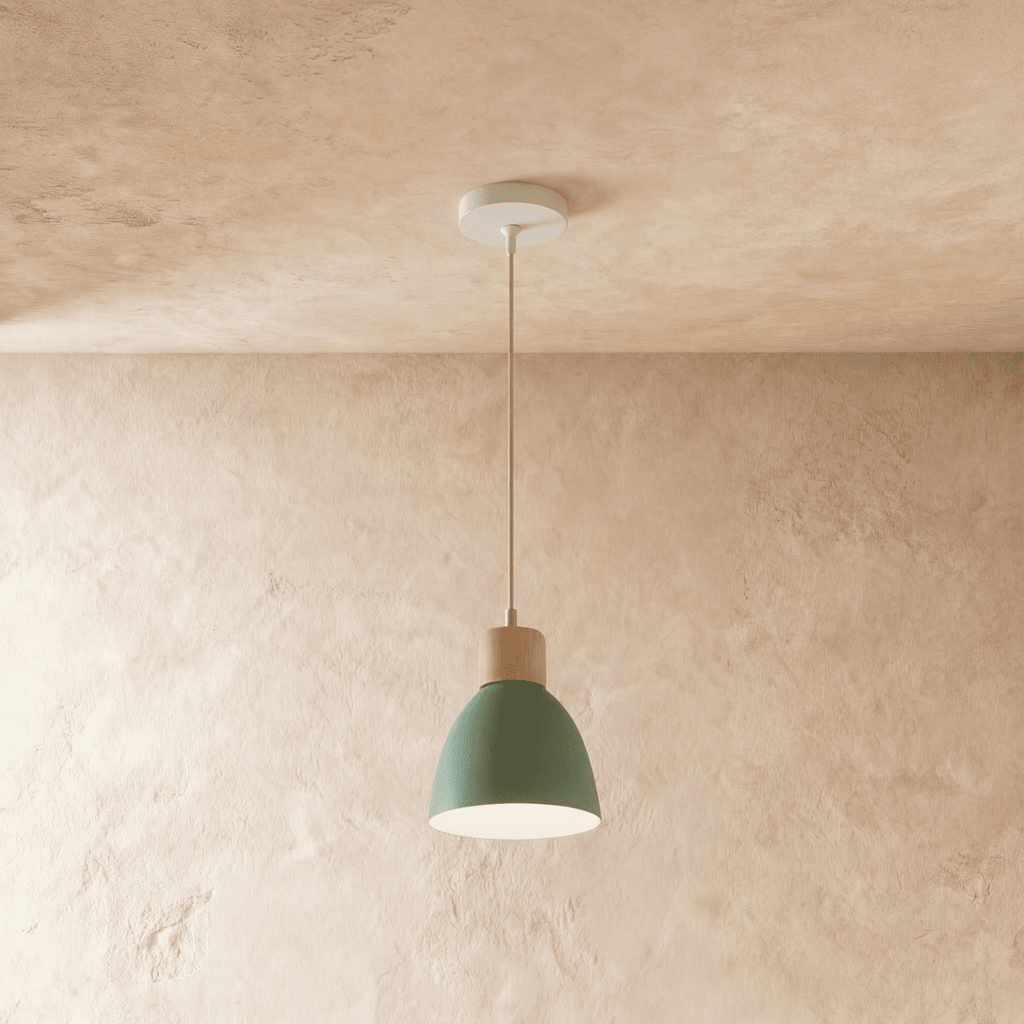 Closer view of the Clérachic single-head green wood disc pendant light showing the wood collar above the shade.