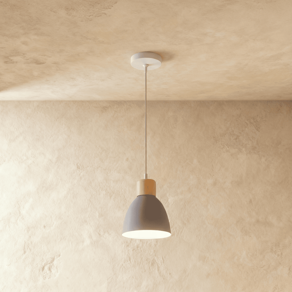 Side angle of the Clérachic single-head grey wood disc pendant light with its wood collar and slim ceiling cable.