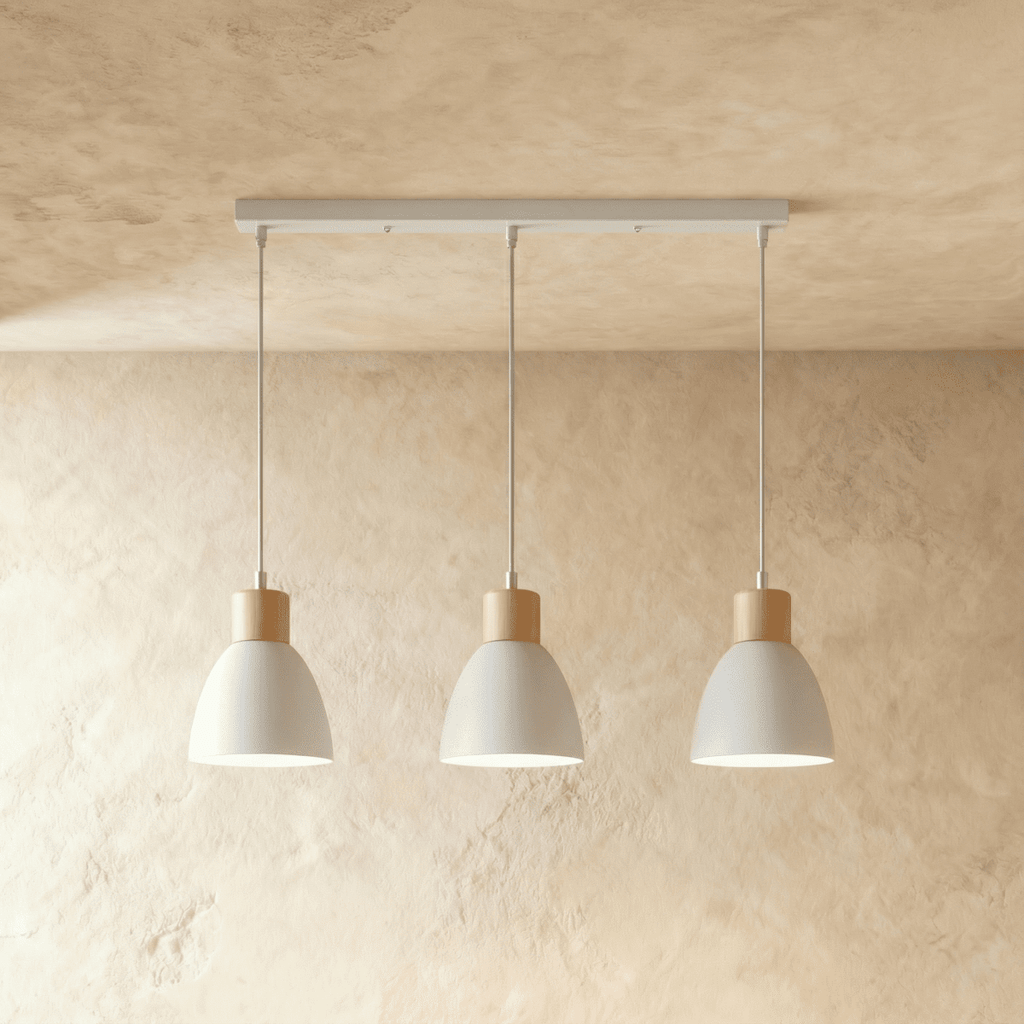 Angled view of the Clérachic three-head white wood disc pendant light row hanging from its linear ceiling bar.