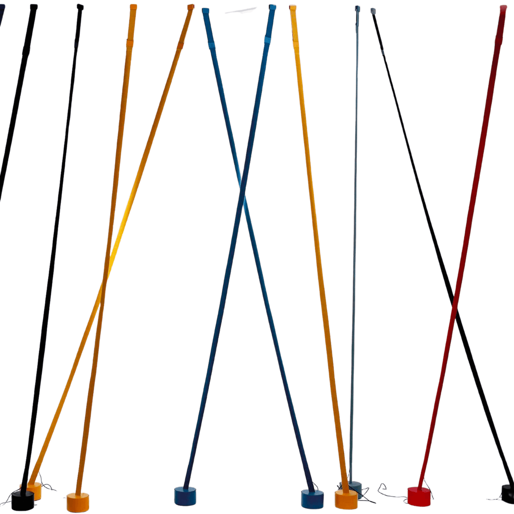 Black, ochre, blue, grey and red Clérachic floor lamp strips lean at crossing angles, each standing on its own round base.
