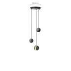 Product view of three Clérachic pendants on a round black ceiling plate, the plate width marked above, one lit.