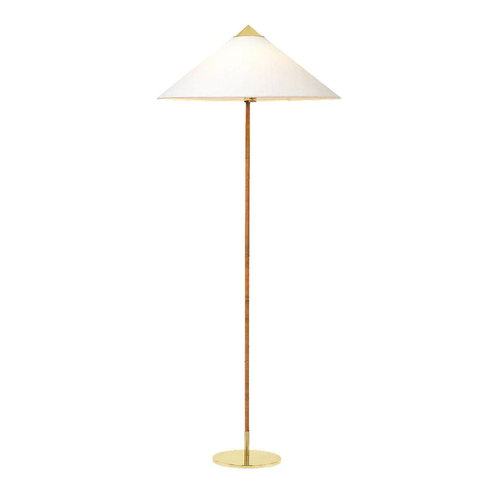 Slim-stemmed Clérachic floor lamp with a white cone shade and a flat round brass base, shown on a plain white backdrop.