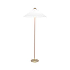 Clérachic floor lamp with a white cone shade, a brown stem and a round brass base, on a plain white backdrop.