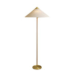 Clérachic floor lamp with a linen cone shade, a wrapped stem and a brass base with the cord at its foot, on white.
