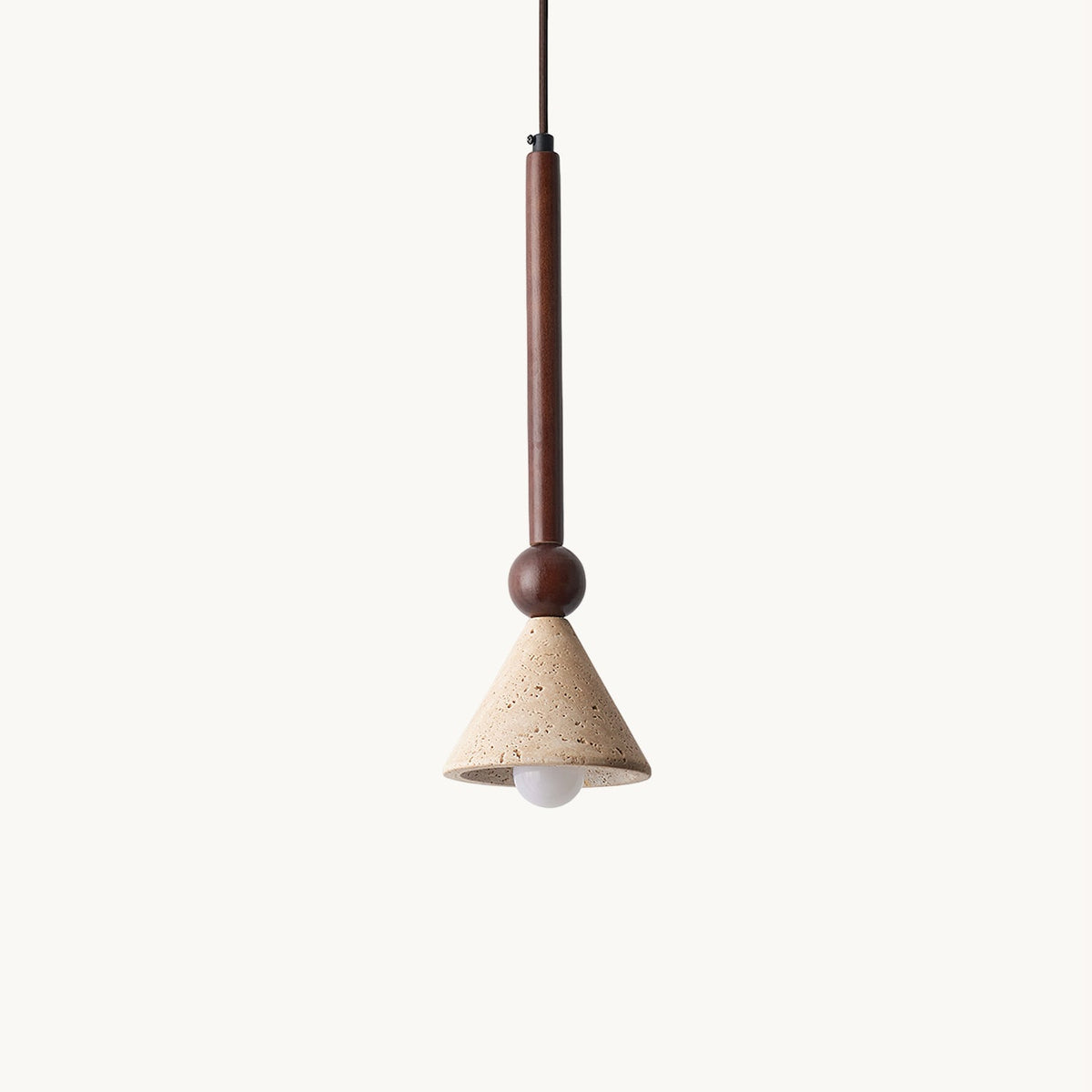 A travertine cone shade with a bare bulb hangs from a dark walnut stem and round wooden bead against a plain cream backdrop, this Clérachic pendant.