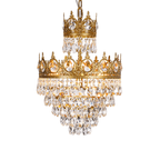Clérachic crystal chandelier on a white background, with two crown tiers and four layers of clear teardrop crystals.
