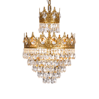 Clérachic chandelier on a white background, with a small crown tier above a larger one and layered clear crystals.