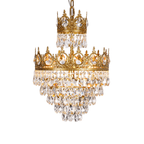 Clérachic crystal chandelier on a white background, showing its two crown tiers and four layers of teardrop crystals.