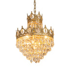 Clérachic crystal chandelier lit on a white background, with crown tiers glowing above layered clear teardrops.