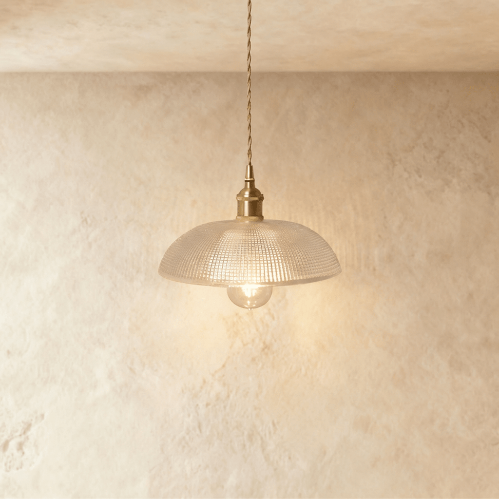Clérachic Isabel pendant light, a scalloped clear glass petal shade with a quilted diamond texture and exposed bulb.