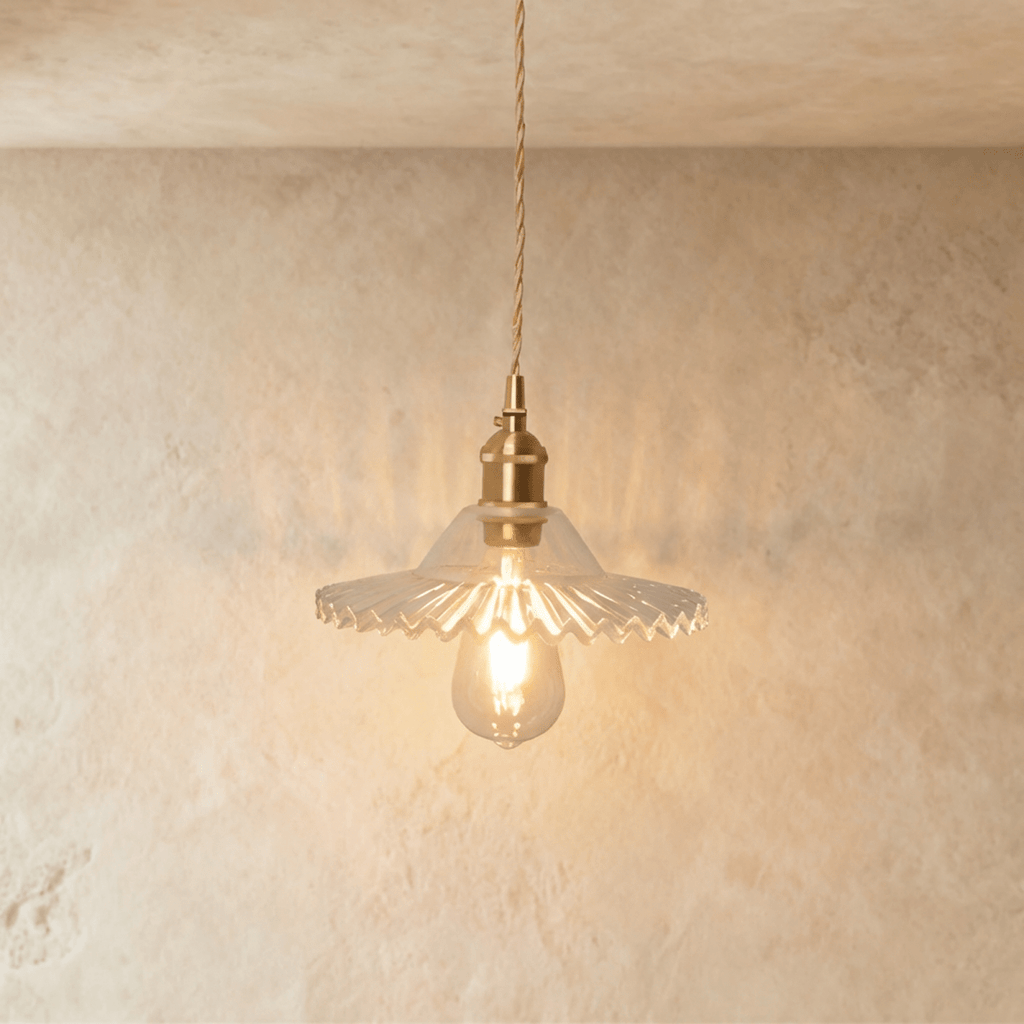 Clérachic Isabel pendant light, a pleated clear glass saucer shade with a pinked scalloped edge and exposed bulb.