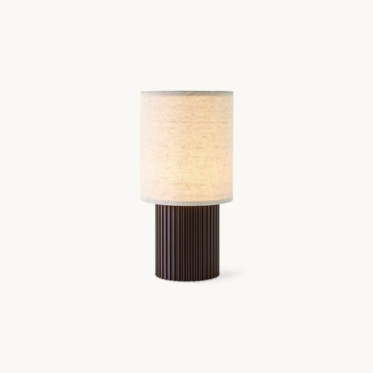 This Clérachic cordless table lamp on a plain white backdrop, a beige linen cylinder shade over a ribbed brown base.