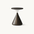 Black-finished Clérachic table lamp with a flat round top on a cone-shaped base, shown on a plain white backdrop.