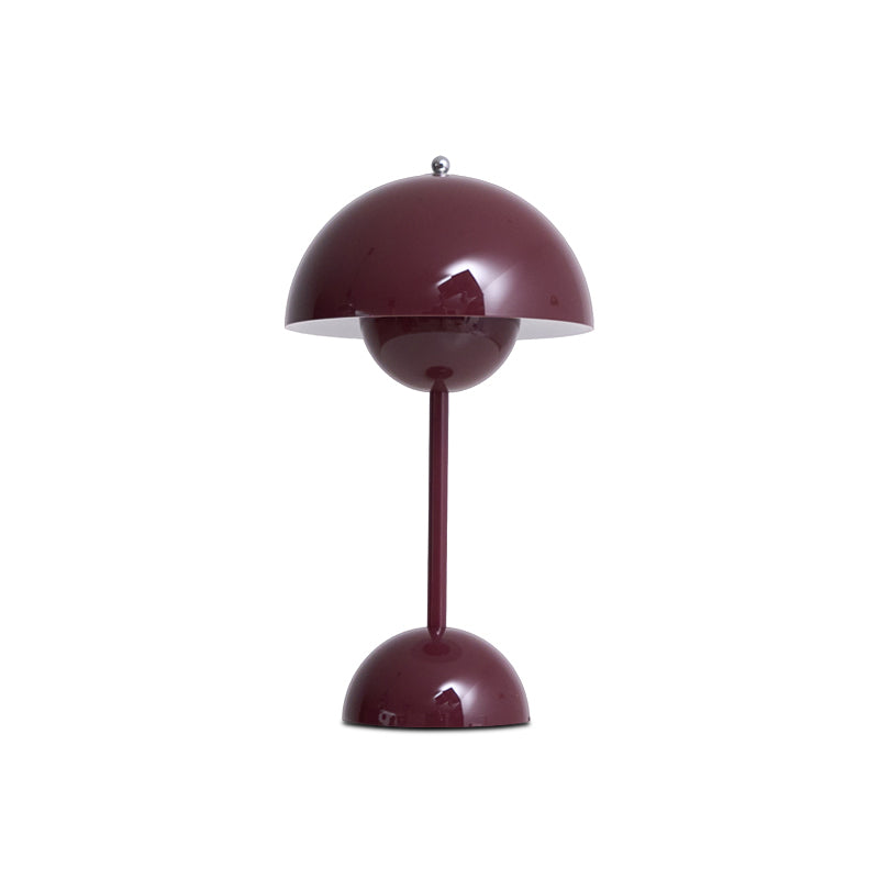 A deep plum Clérachic table lamp with a glossy dome shade and a slim stem, on a plain white backdrop.