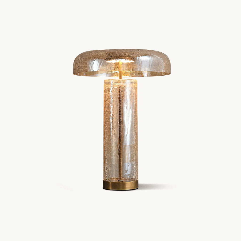 A smaller view of the Clérachic table lamp on white, its dome and cylinder in amber-tinted cracked glass, with a bronze base.