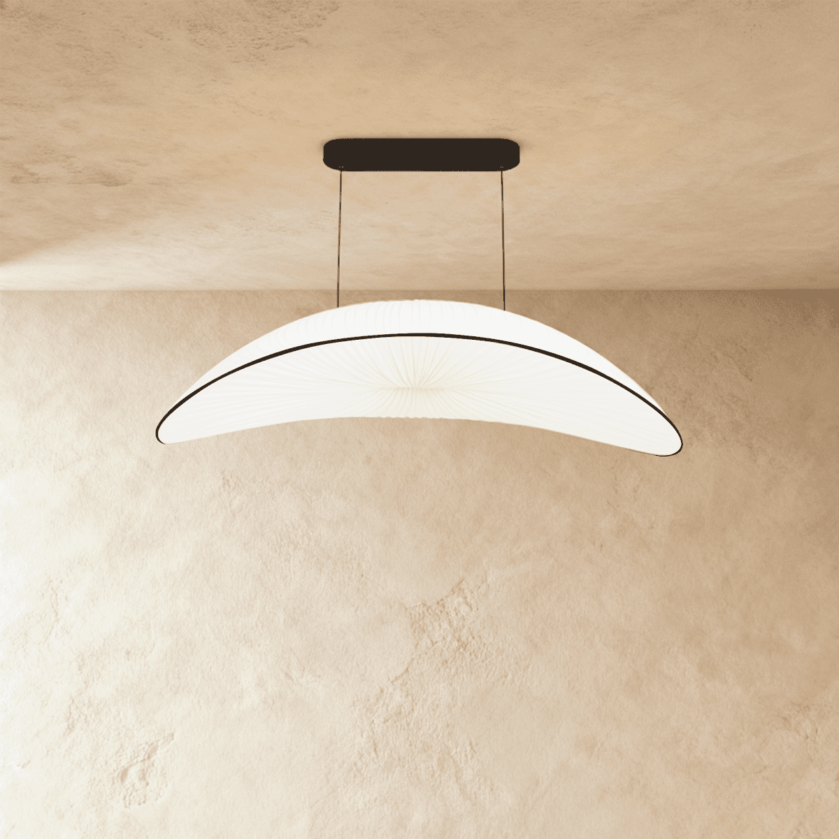 Straight-on view of the Clérachic cream fabric chandelier, its curved pleated shade suspended on thin black cables.