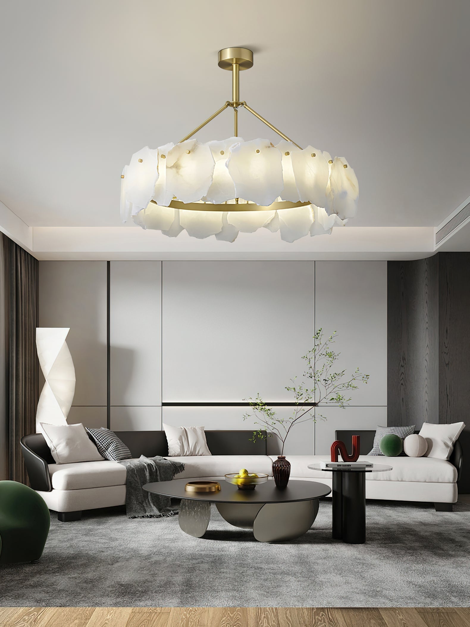 Clérachic Cryon hung high in a pale open living room, three brass stem arms holding the alabaster ring level.