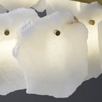 Clérachic Cryon detail showing the chalky alabaster edge and a faint amber vein running through the stone.