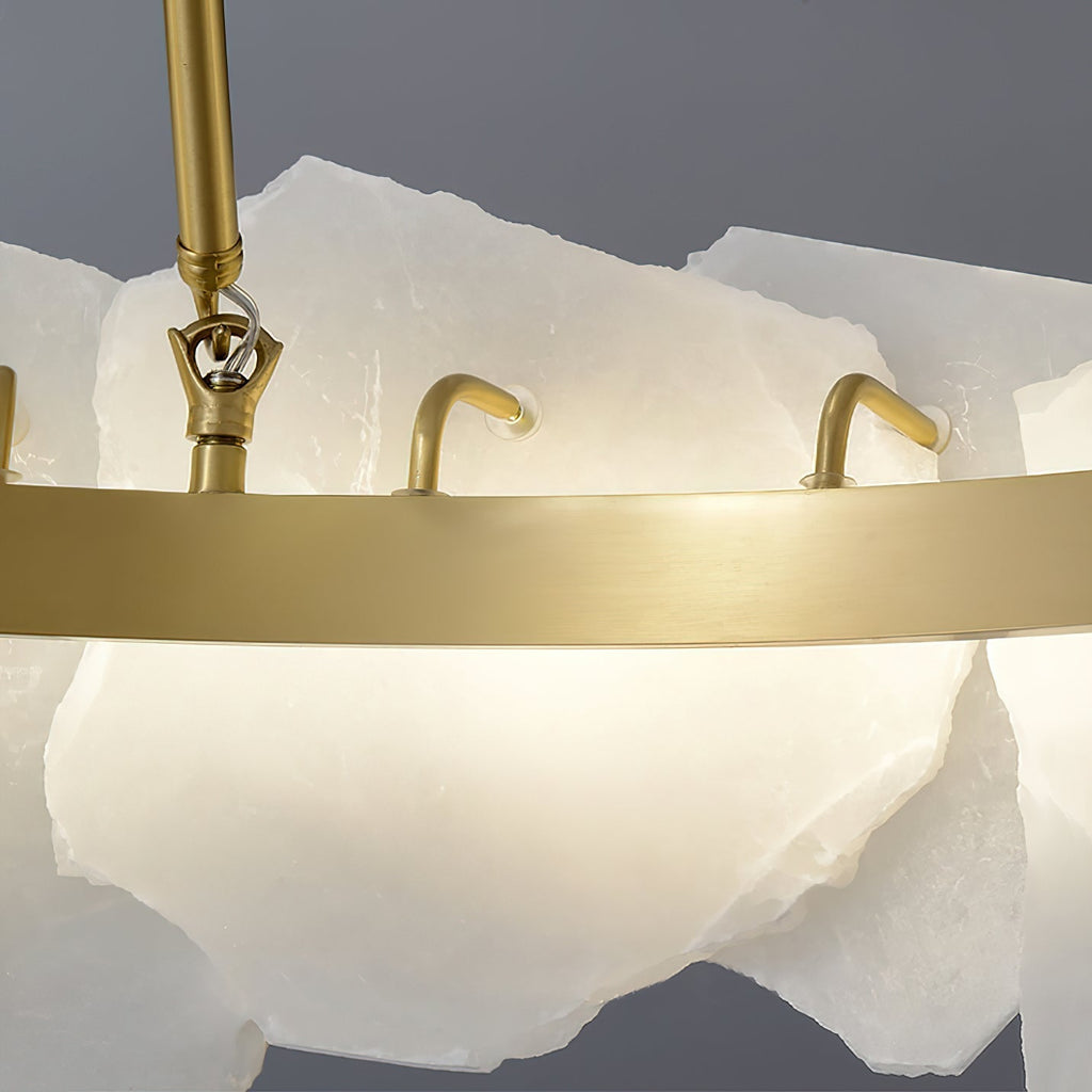 The Clérachic Cryon detail of the brushed brass band and the curved brass hooks that cradle each stone plate.