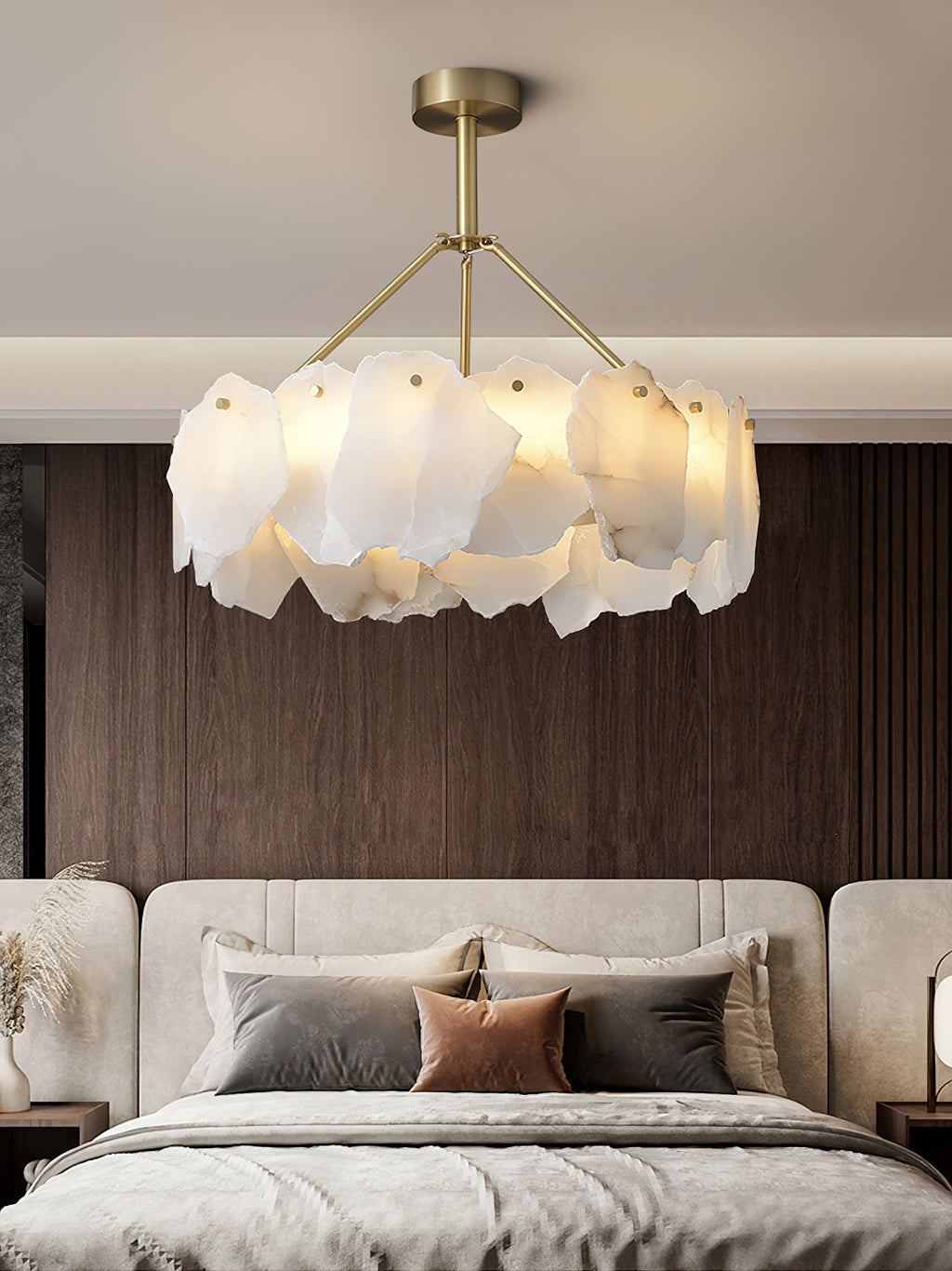 Clérachic Cryon lit above a wide upholstered bed, set against a dark timber wall in a calm bedroom.
