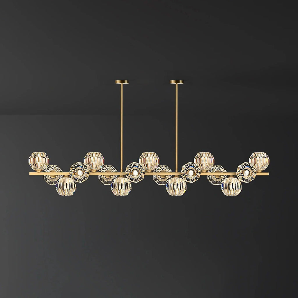 Longest bar of this Clérachic chandelier, its many crystal balls spread wide across a dark grey backdrop.
