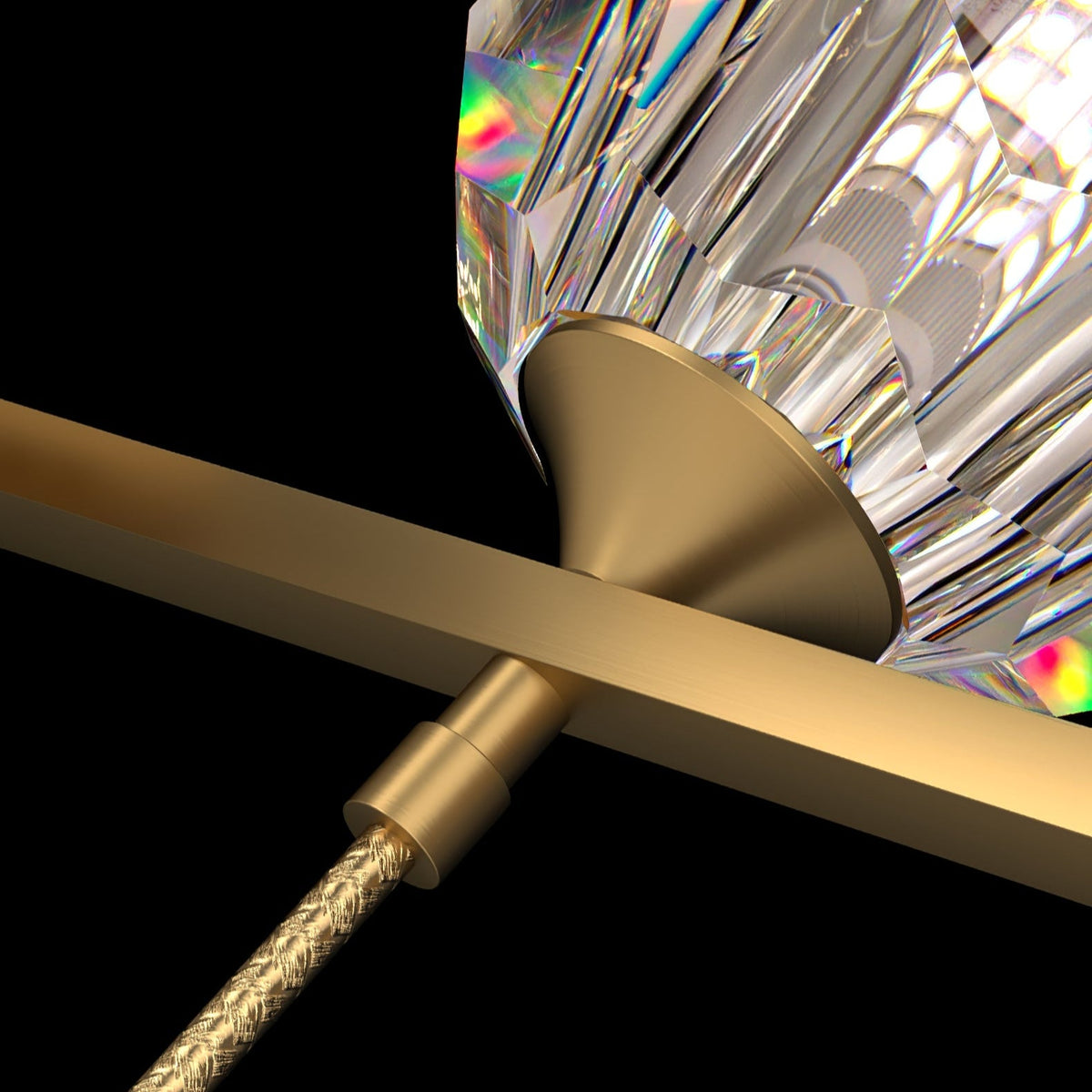 Close view of the brass cone and the woven cord below the bar, holding a crystal ball on this Clérachic chandelier.